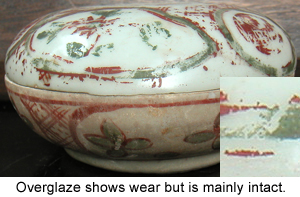 Painted overglaze decoration on this Chinese Porcelain shows wear after centuries underwater.