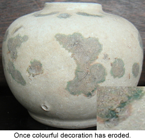 Painted overglaze decoration on this Chinese Porcelain shows severe wear after centuries underwater.